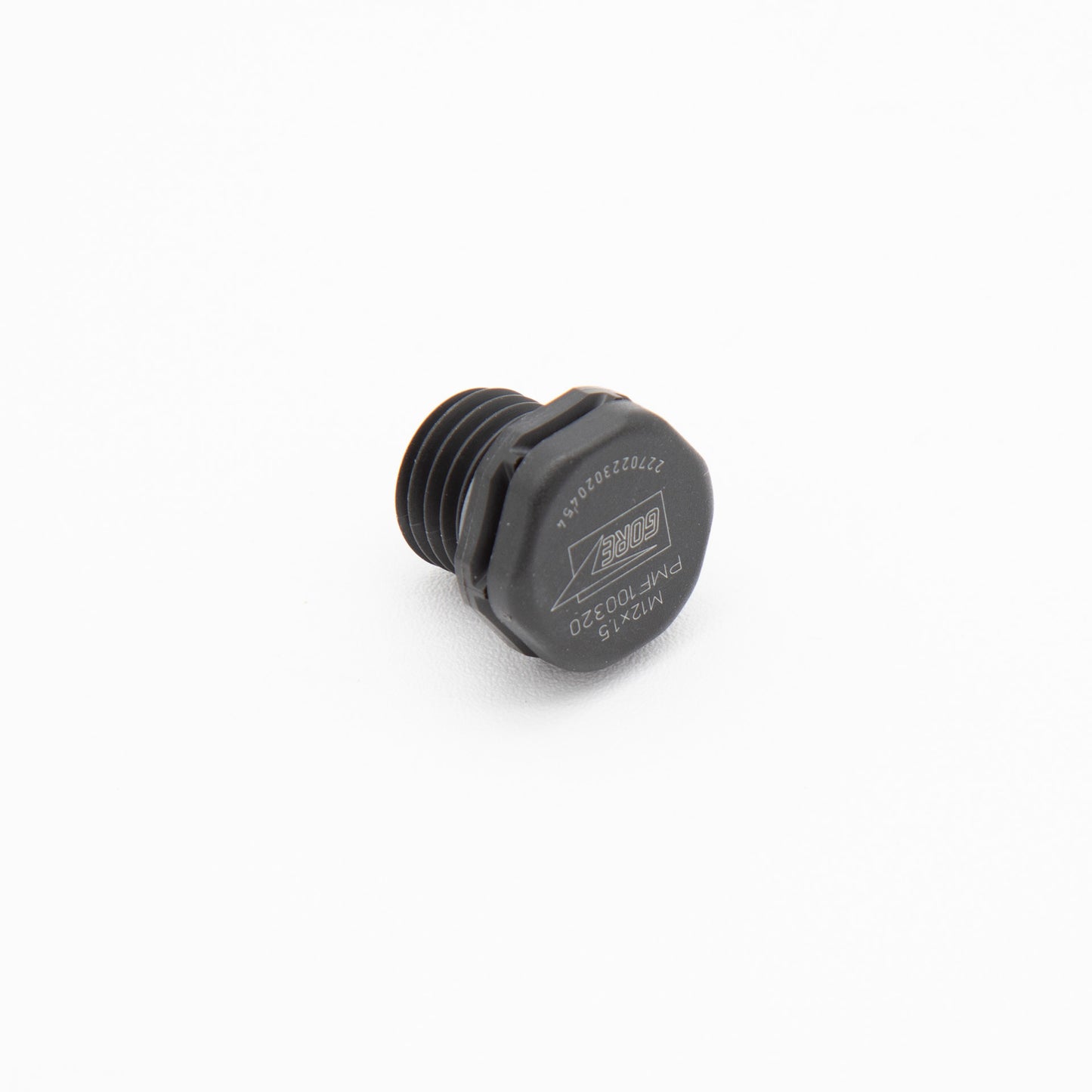 A black plastic plug positioned on a clean white background, highlighting its shape and texture.