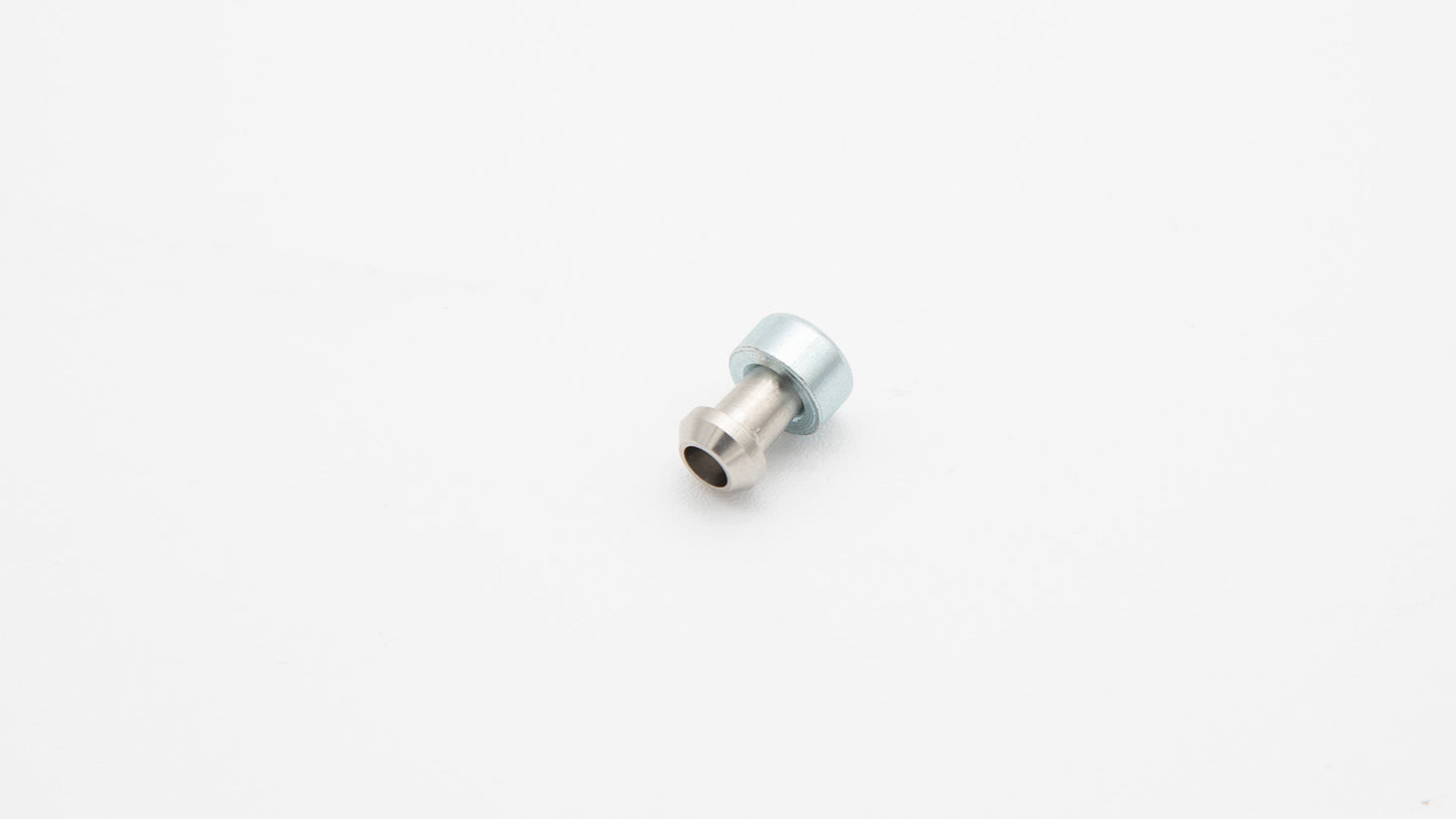 A close-up of a small metal connector placed on a white background, highlighting its design and color.