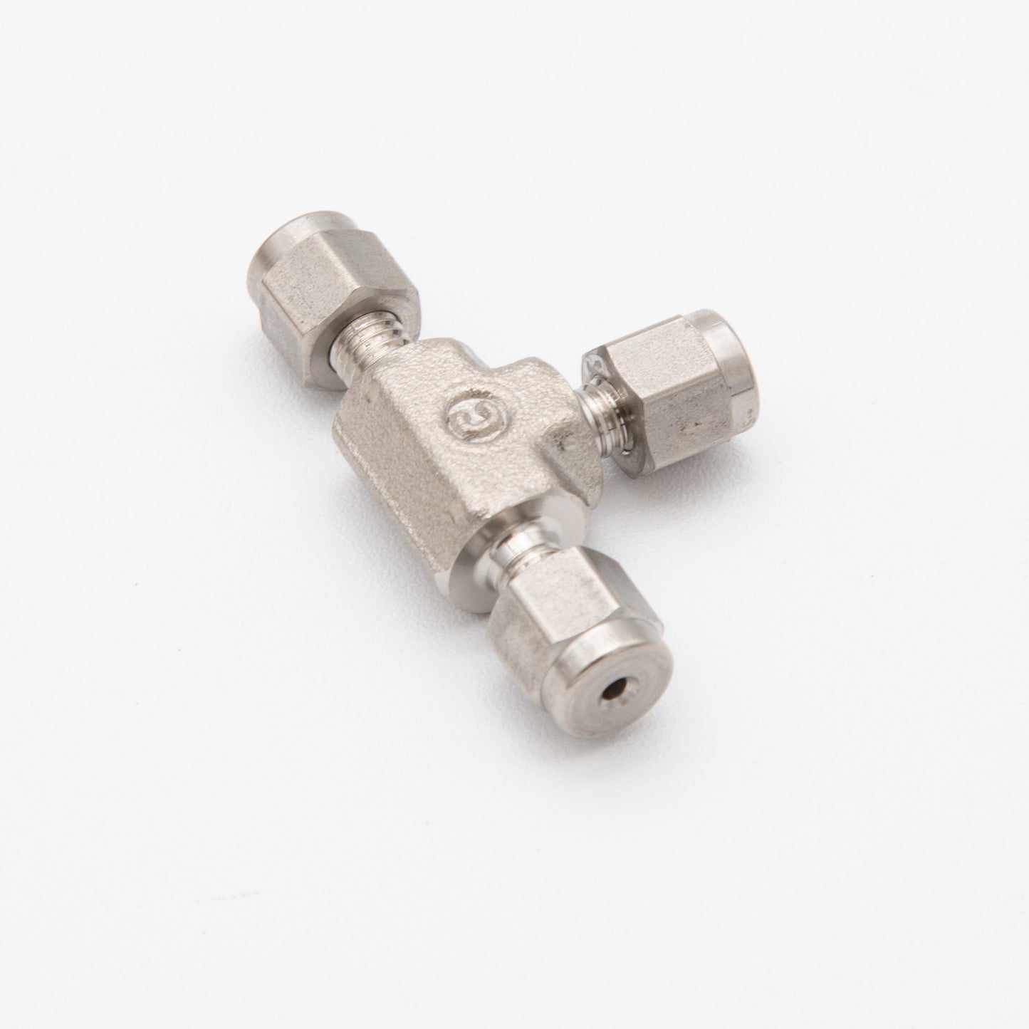 A stainless steel fitting displayed against a clean white background, showcasing its sleek design and metallic finish.