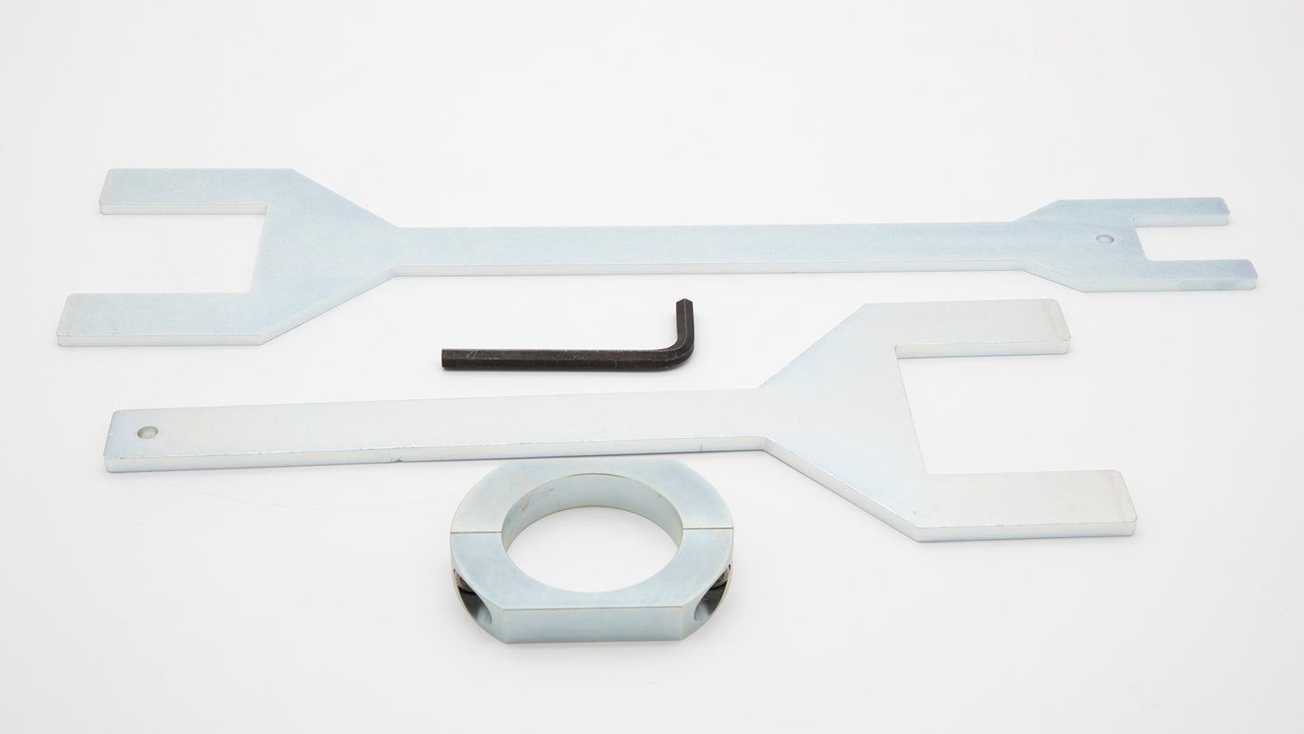 A tool set containing two wrenches, hex key and a holder, ideal for various repair and assembly tasks.