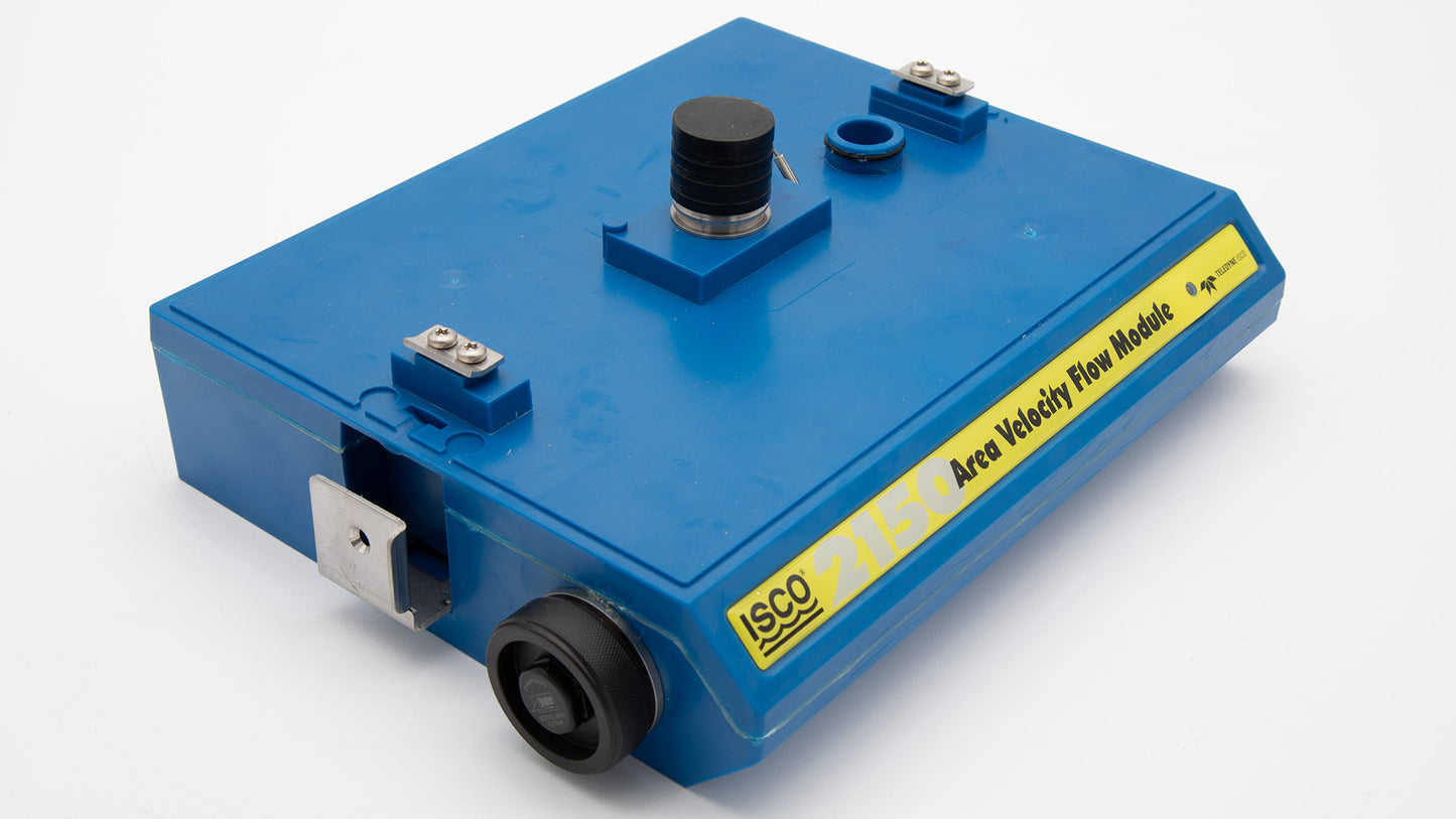 A blue box equipped with a yellow label and black connections, showcasing a simple yet effective interface for operation.