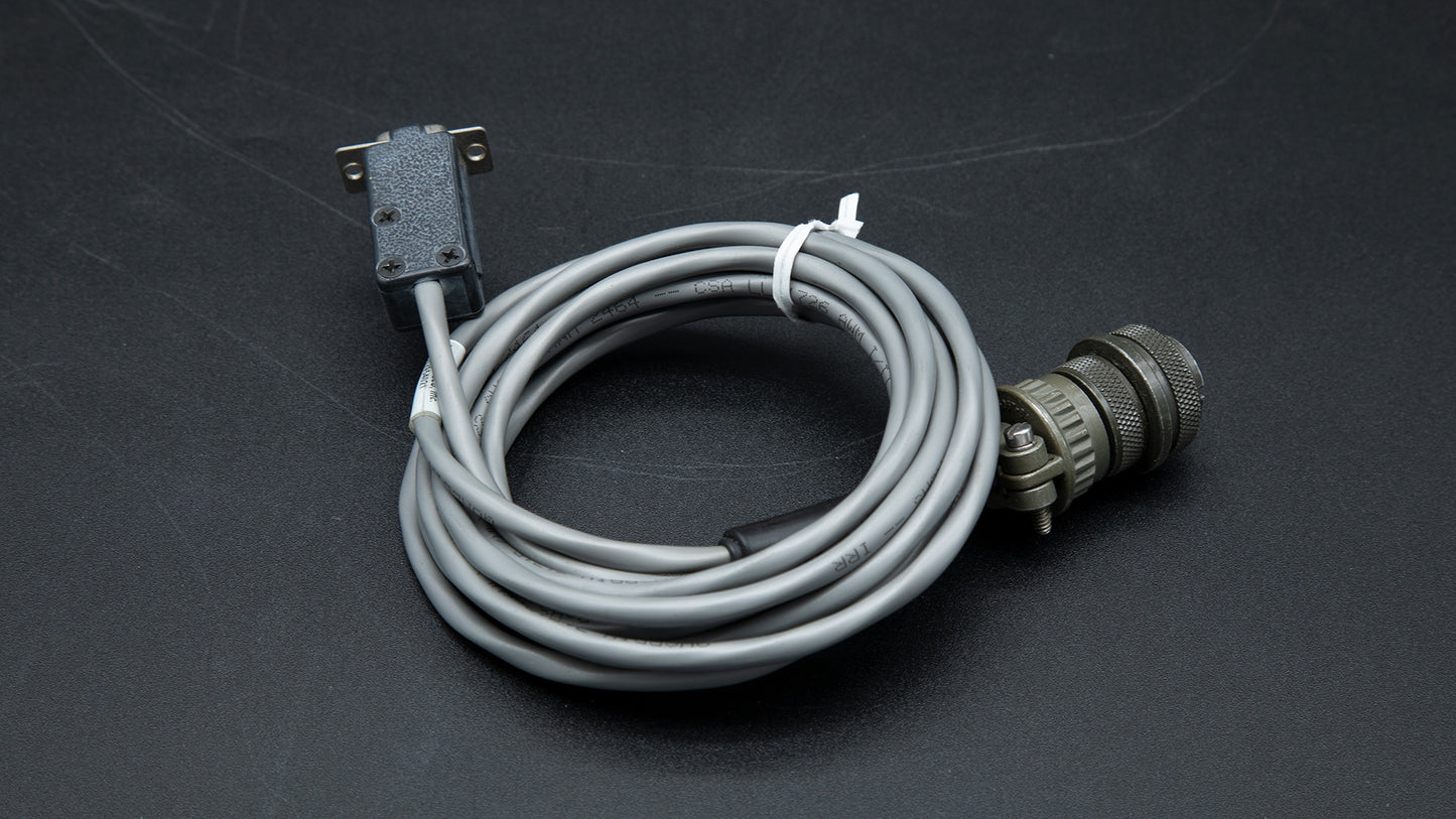 A cable featuring a connector on one end and a plug on the other, illustrating its connectivity function.
