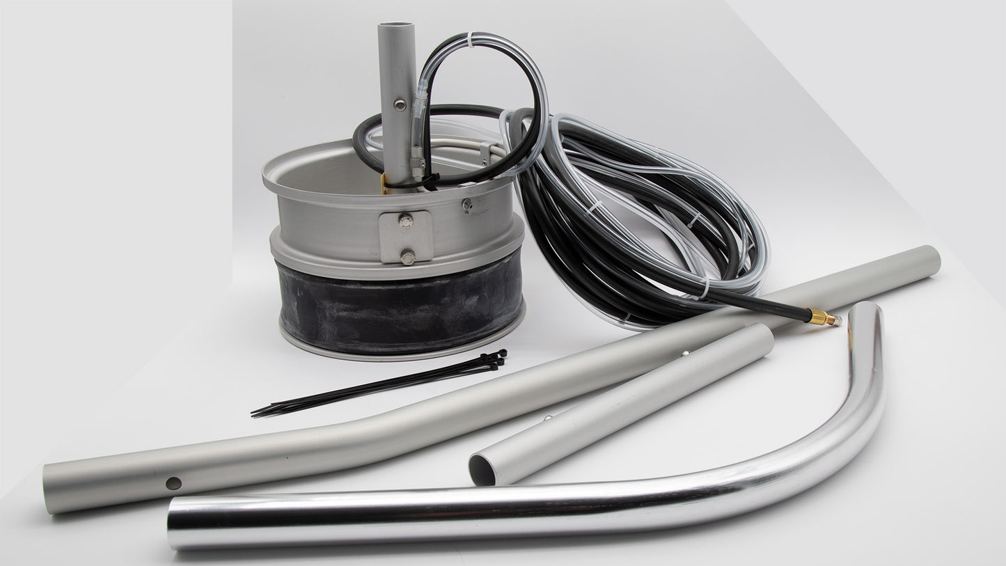 Various items displayed, featuring a metal pipes and hose, highlighting a well-equipped workspace for maintenance tasks.