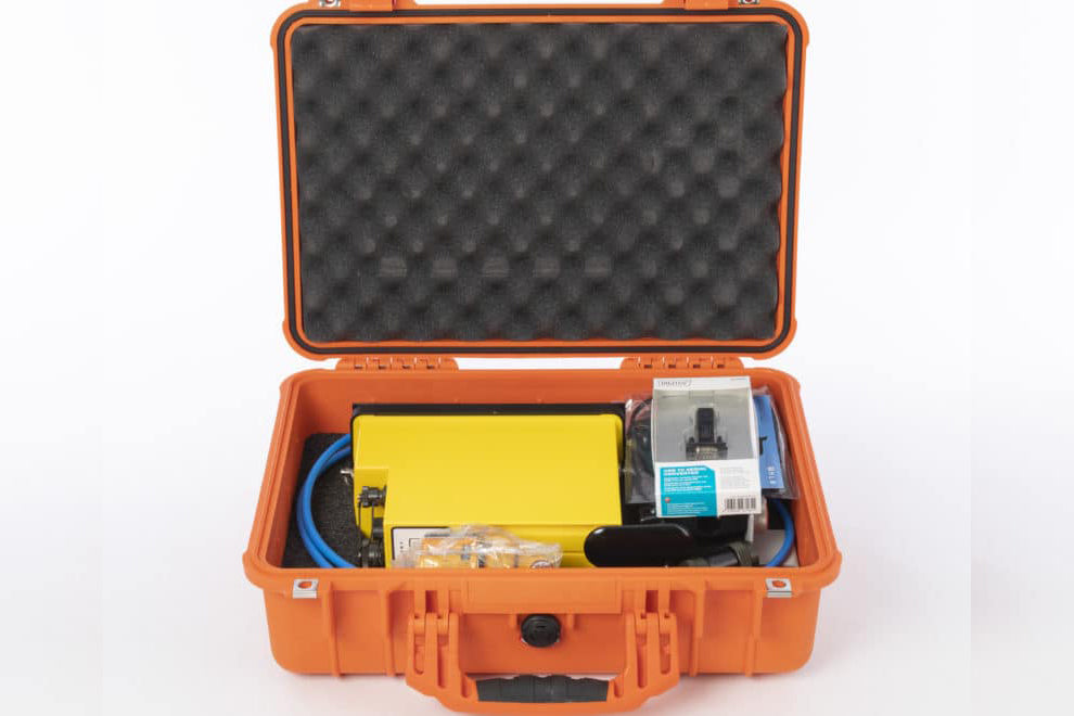 compact electronic device encased in an eye-catching orange cover, emphasizing its portability and contemporary style.