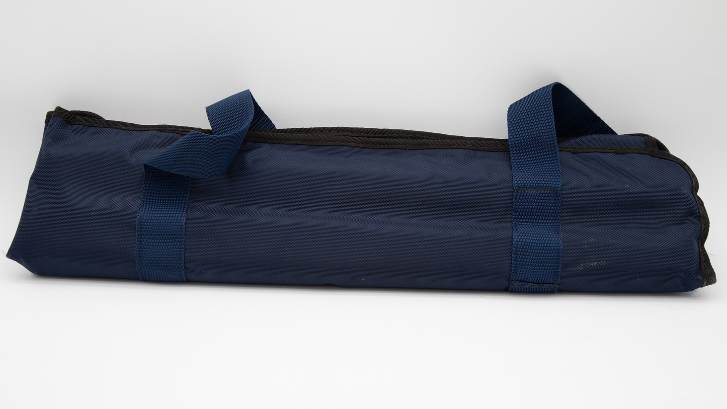 A blue canvas bag adorned with a strap, combining practicality and style for various activities.