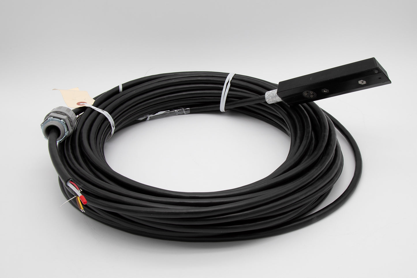 A black cable featuring a plug and sensor, suitable for various electronic devices and connections.