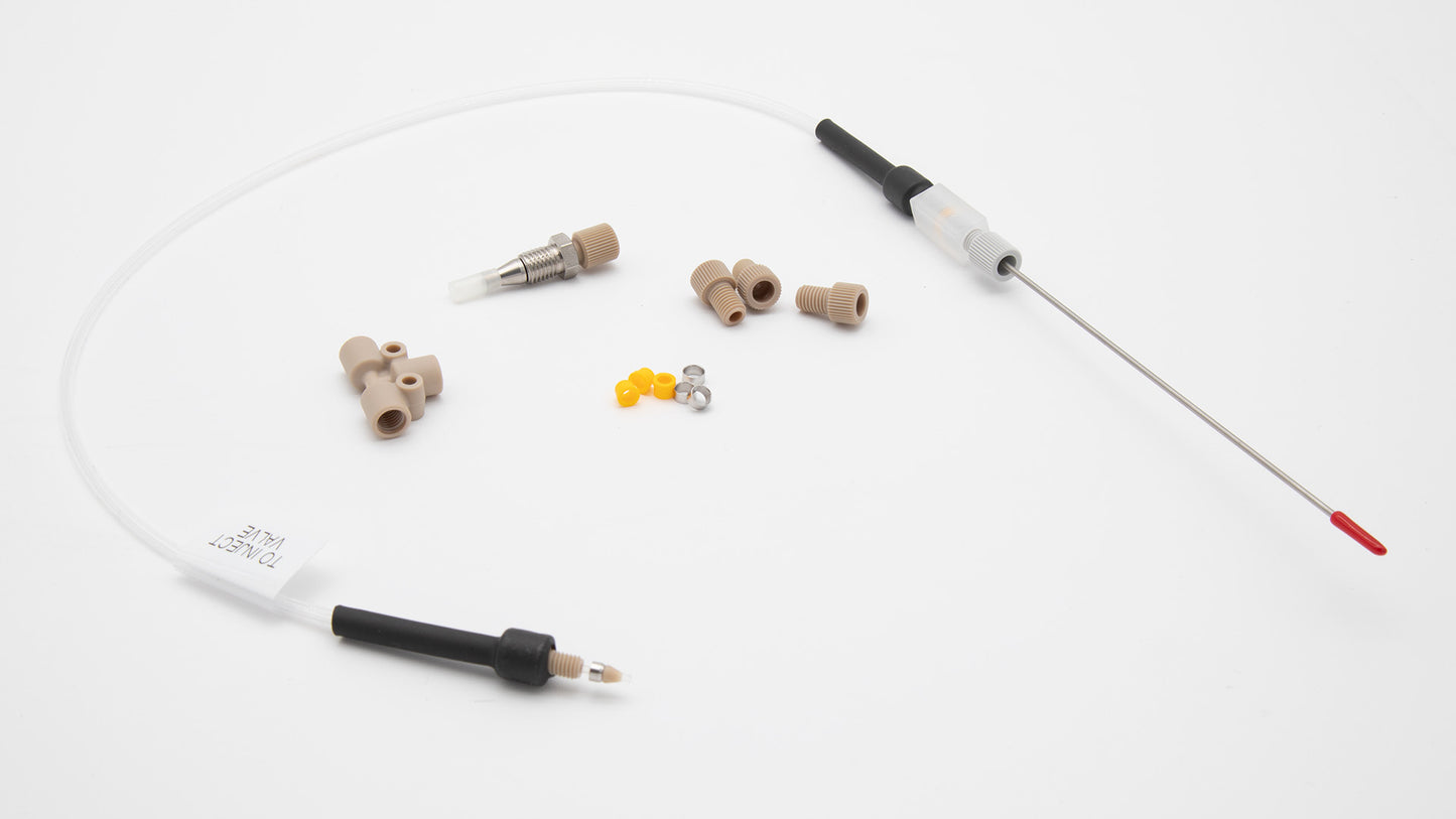 A length of tubing featuring a connector and needle plus various other items, showcasing a simple yet functional design.