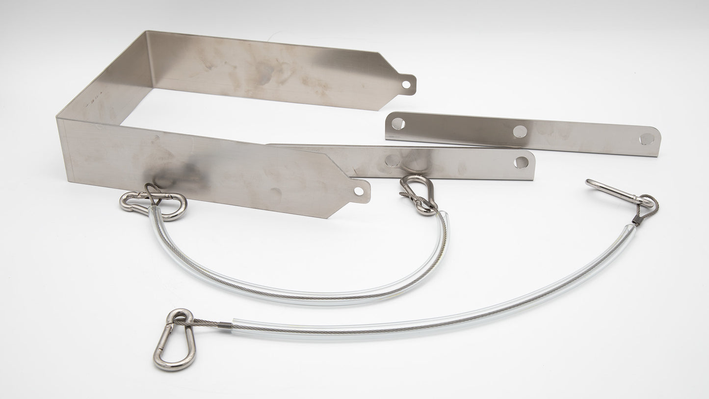 A pair of stainless steel cables with hooks positioned next to a metal plate, showcasing their sleek and durable design.