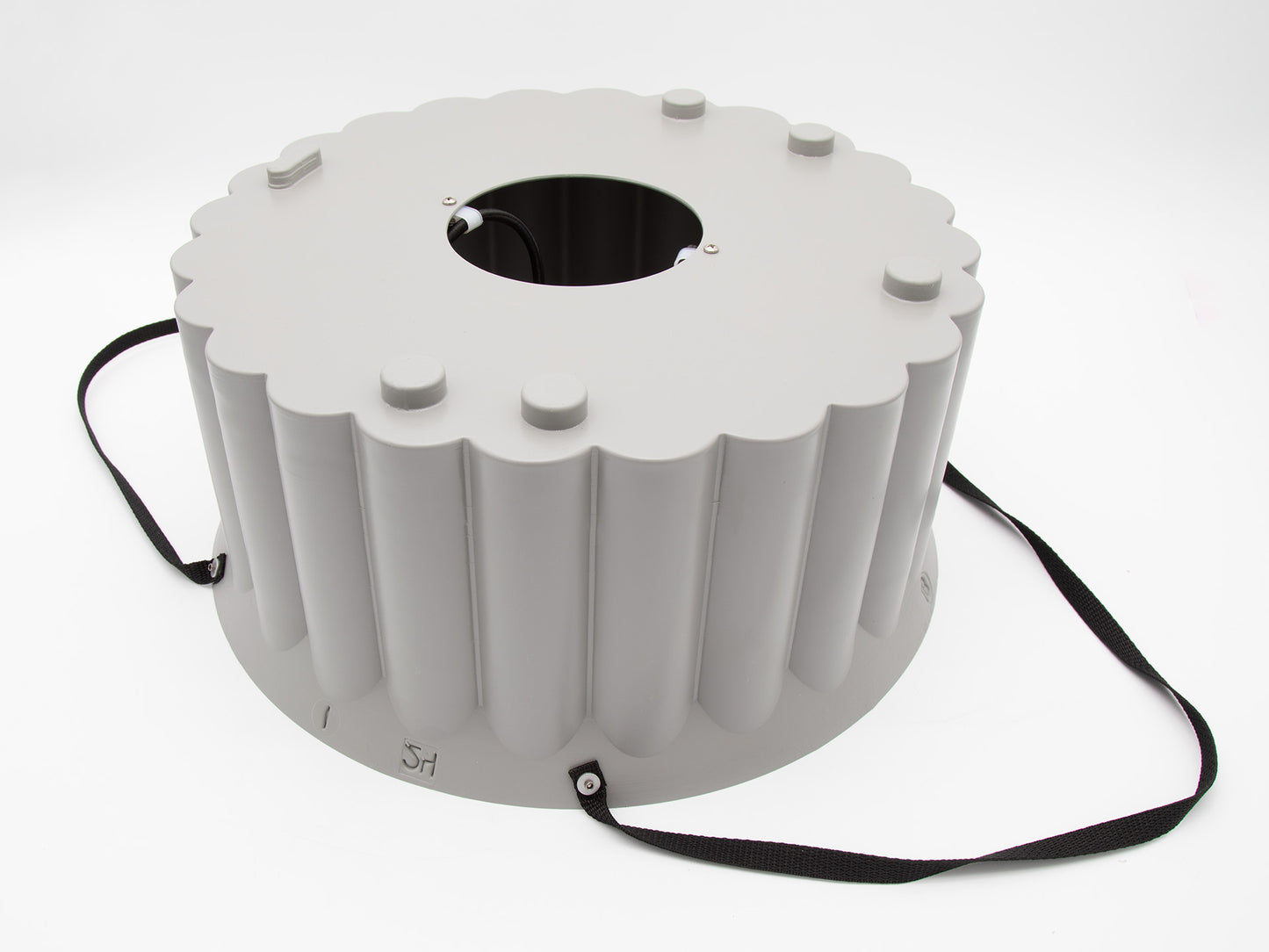 A plastic tub secured with black straps, showcasing a simple and functional design.