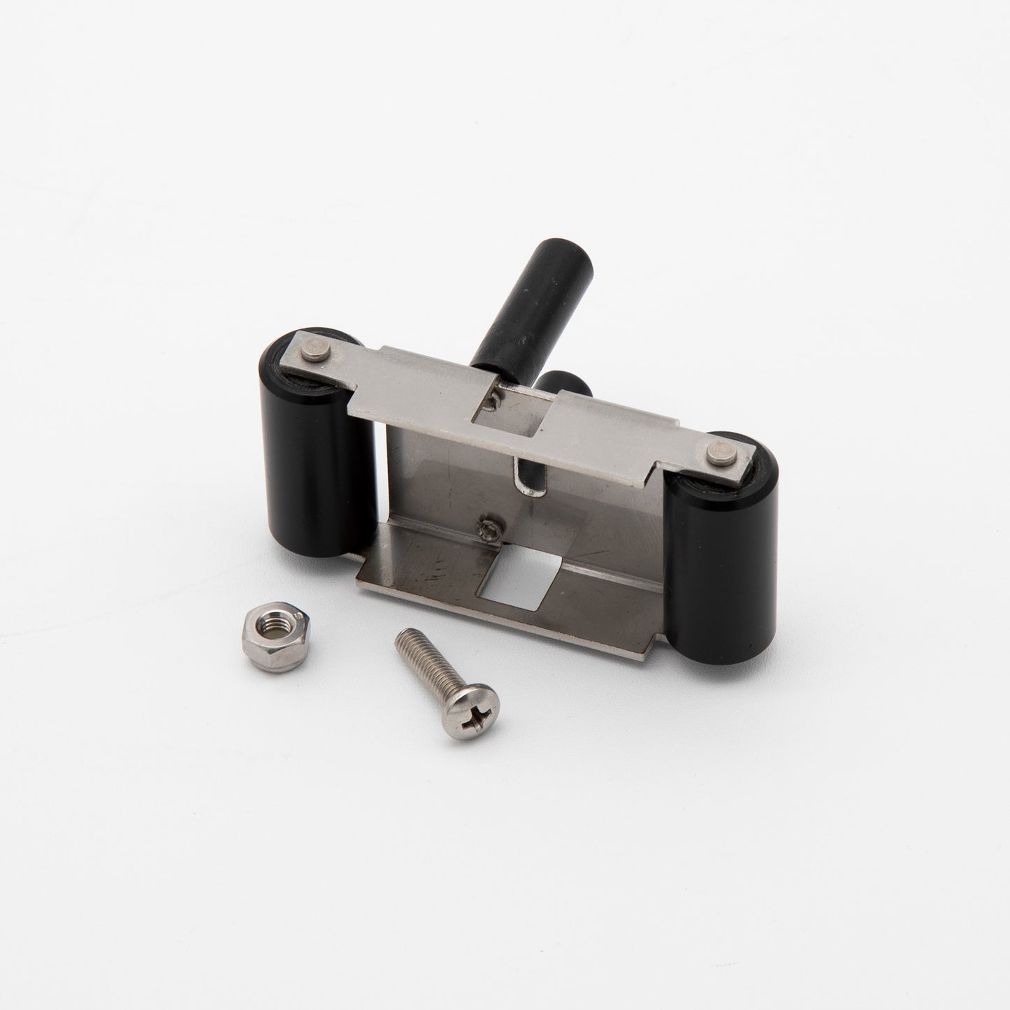 A small device featuring rollers, a nut and a screw, showcasing its compact and functional design.