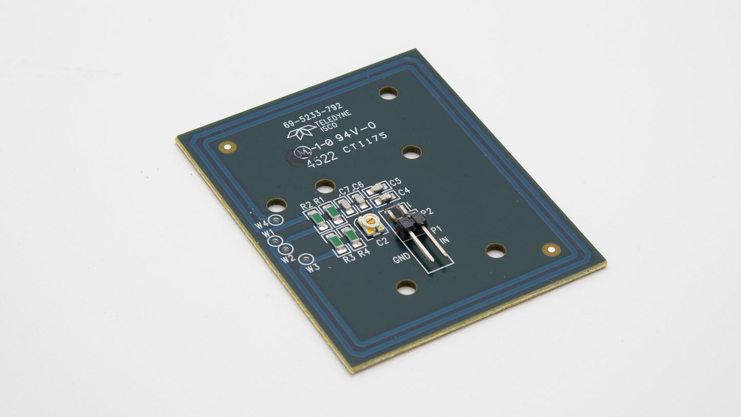 A small electronic device resting on a clean white surface, showcasing its sleek design and modern technology.