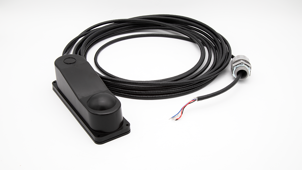 Black electronic device with a cable on a white background