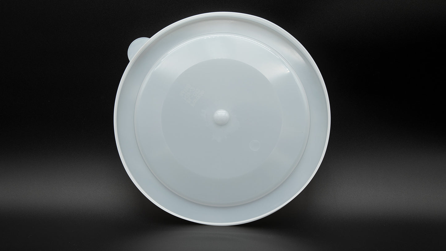 A white plastic lid, designed for various sealing or storage purposes.