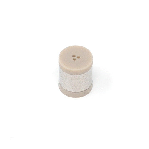 A cylindrical shaped check valve featuring a white body.