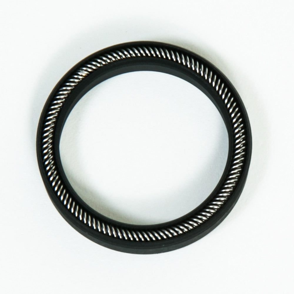 A black rubber ring positioned against a plain white background.