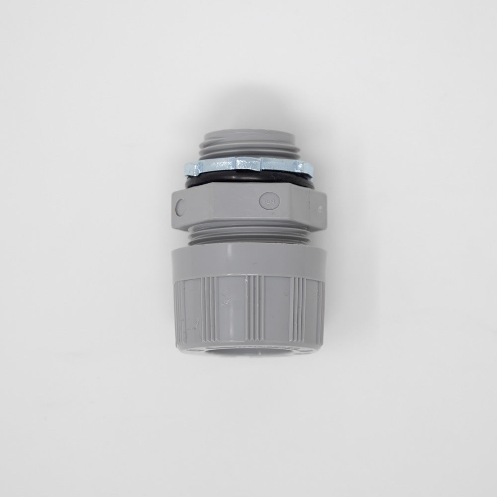 A grey plastic fitting, designed for secure and efficient connections.