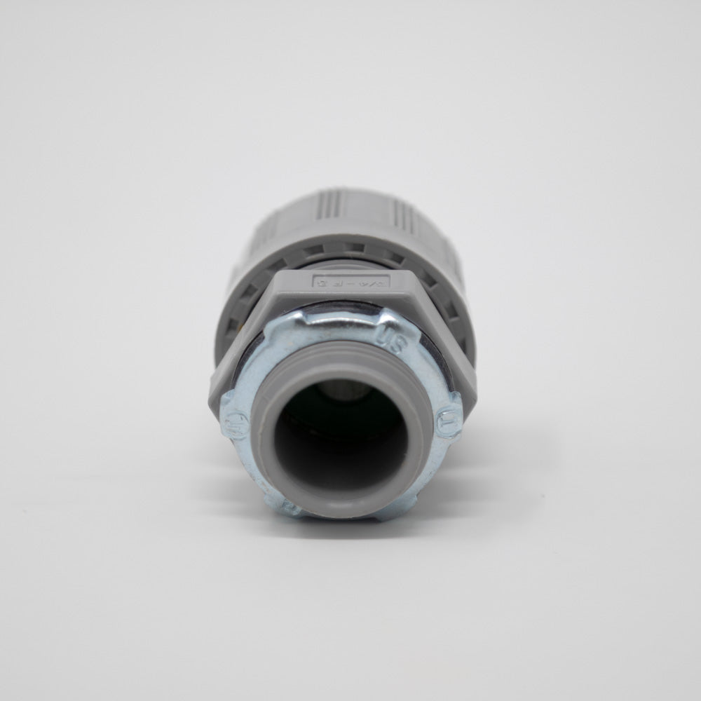 A grey plastic fitting, designed for secure and efficient connections.
