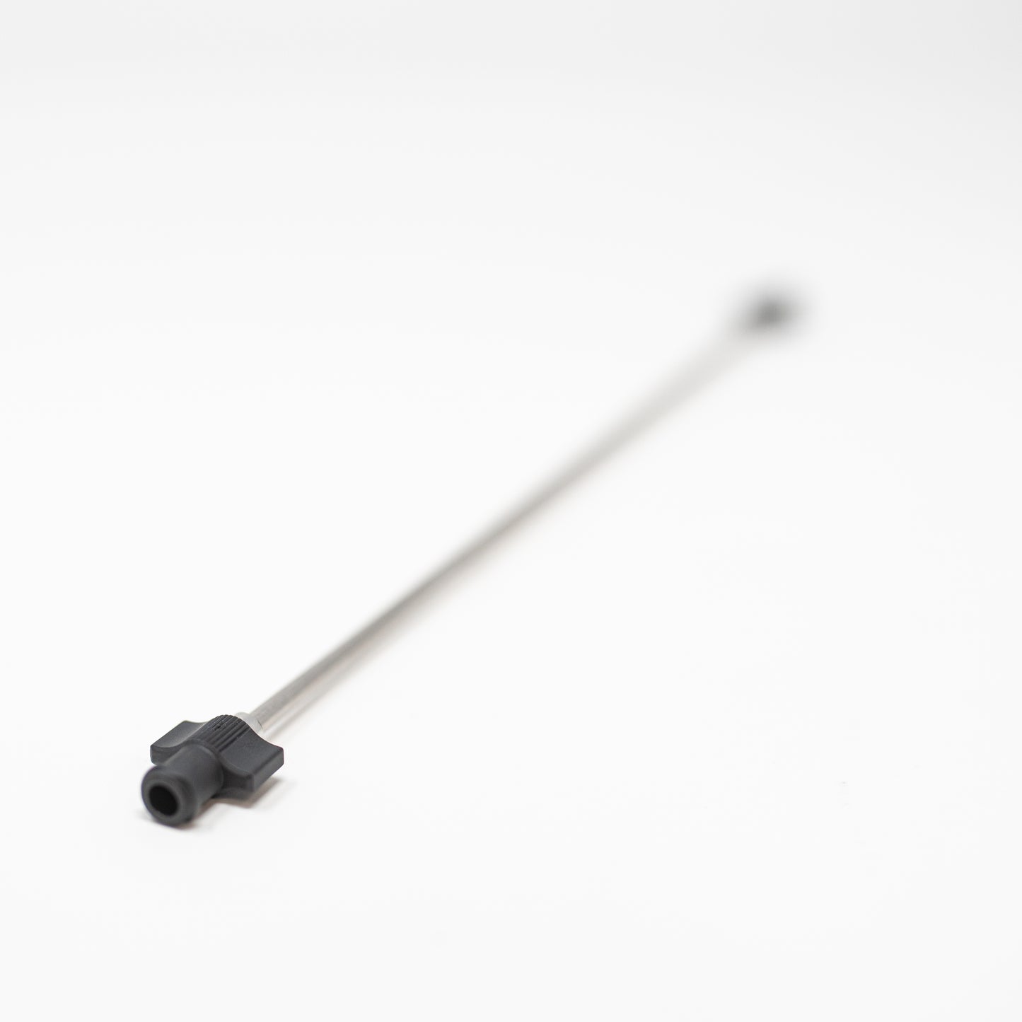 A metal rod featuring a black connectors, positioned against a clean white background.