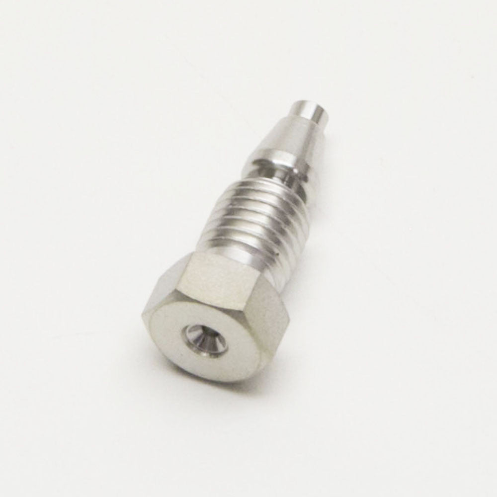 An aluminum threaded nut resting on a clean white surface, showcasing its metallic texture and detailed threading.