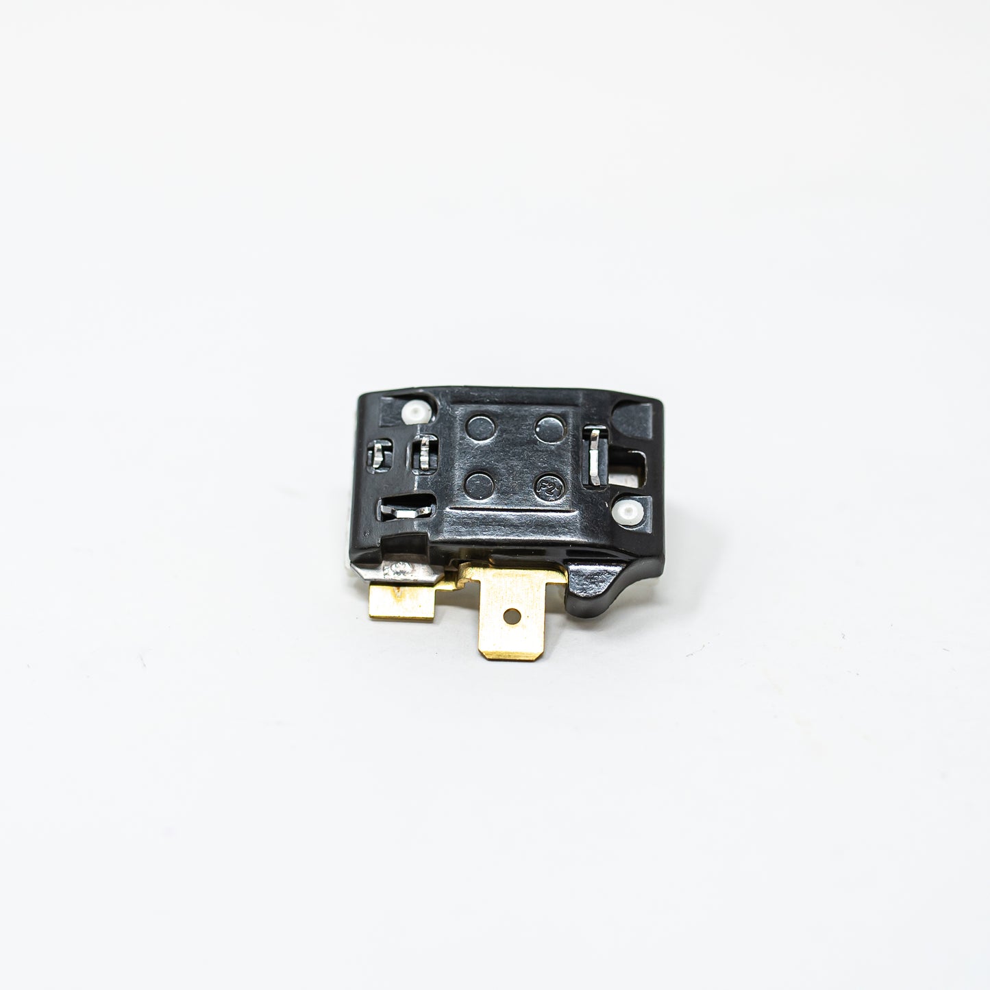 A black and gold electrical device with a small hole, highlighting its elegant and functional design.