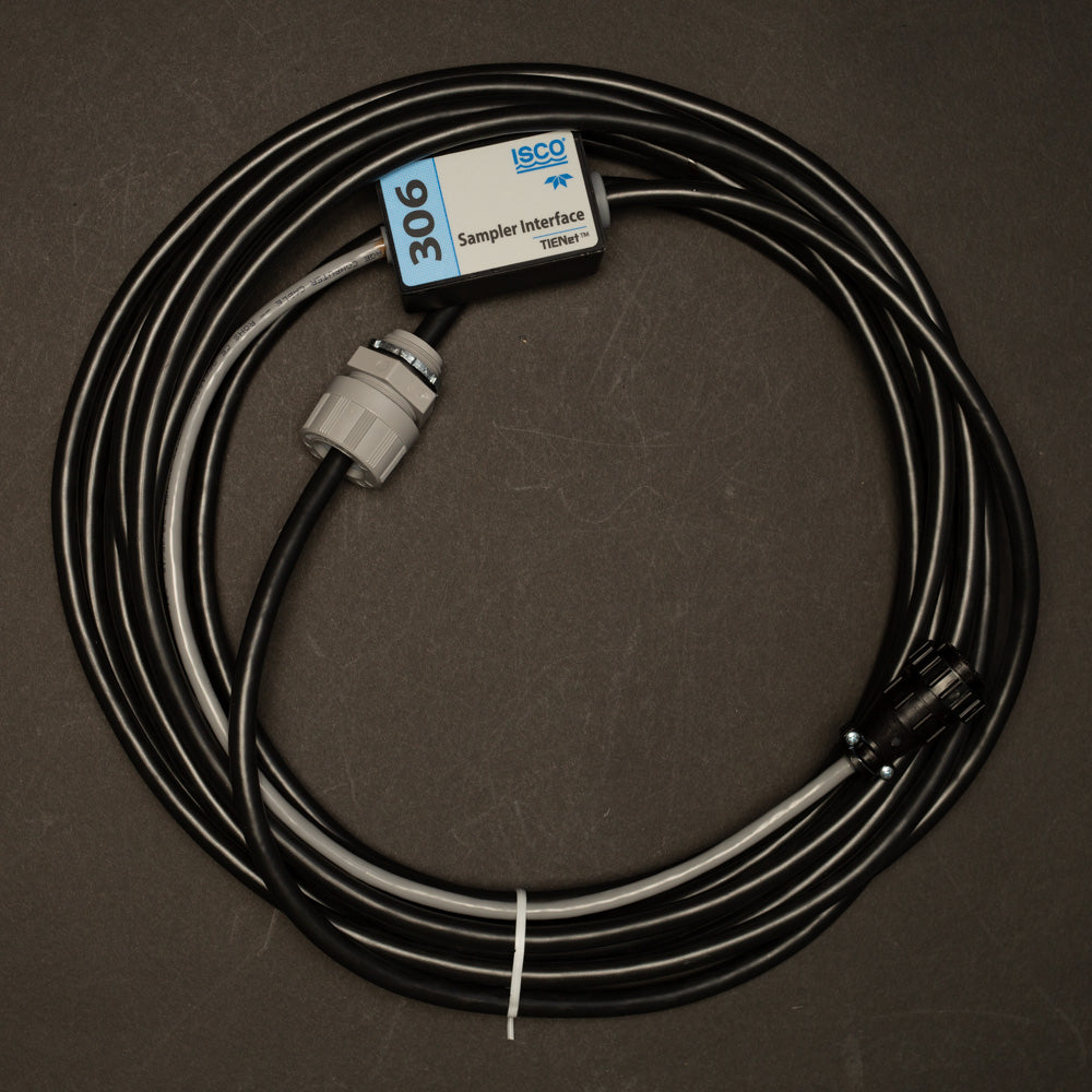 A cable displayed prominently, showcasing a blue and white label affixed to its interface box.