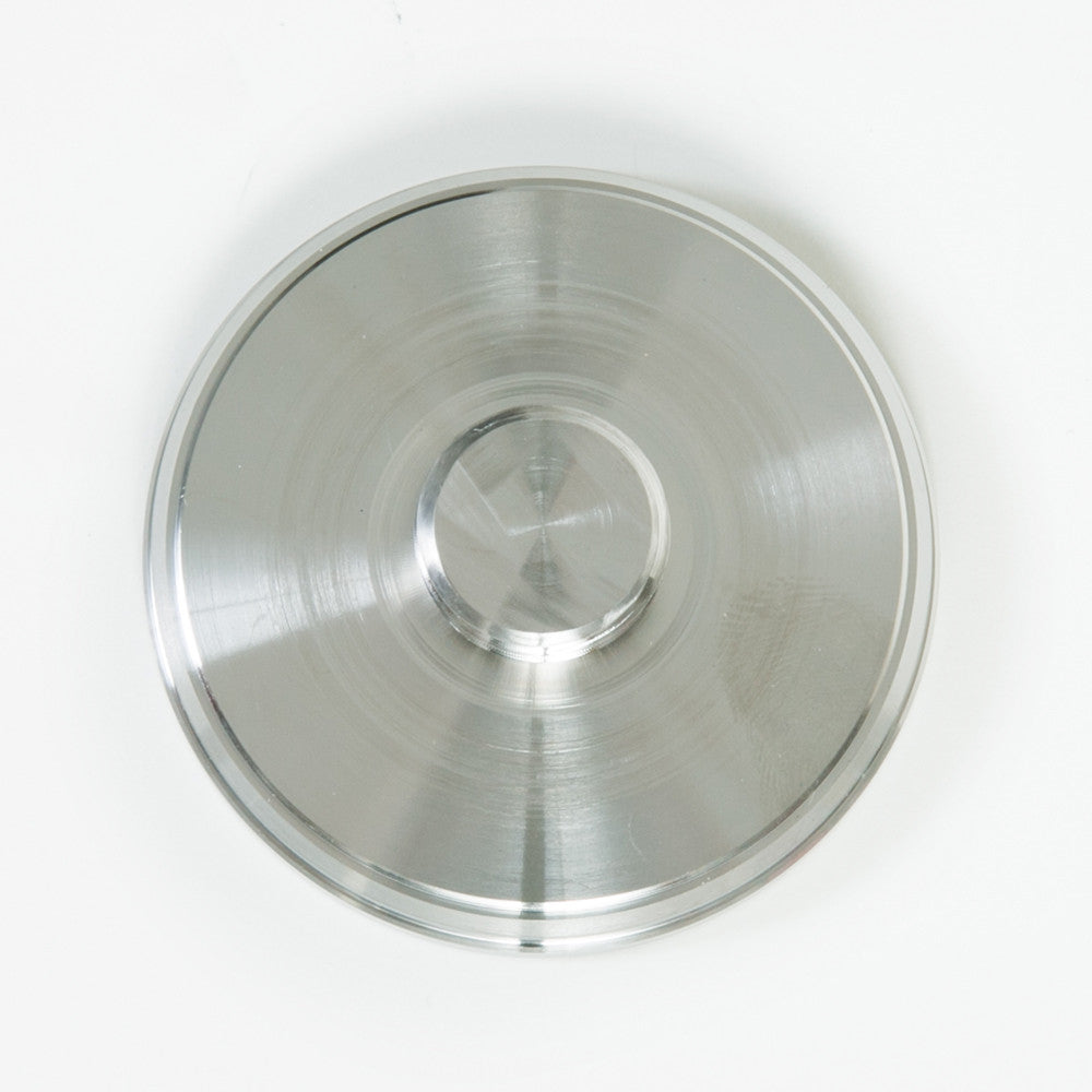 A single hastelloy piston displayed on a white background, emphasizing its shiny texture and precise threading design.