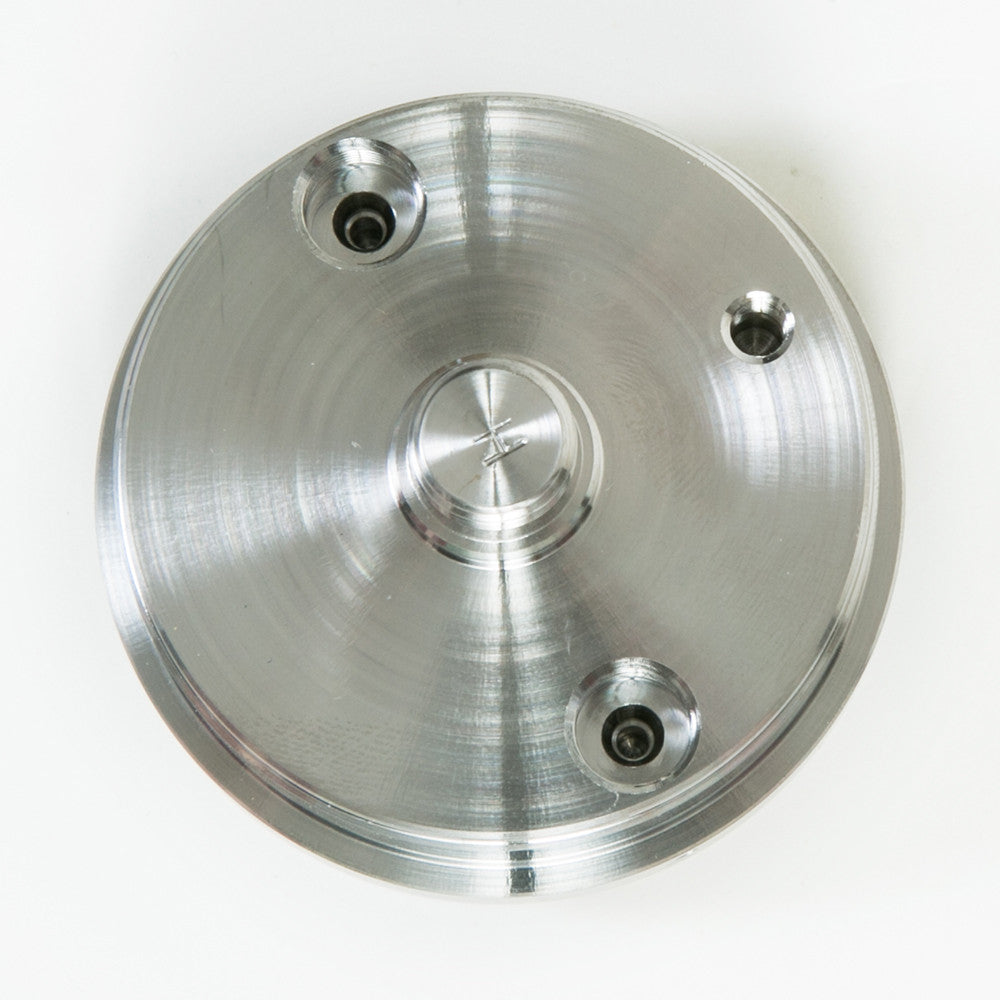 A single hastelloy piston displayed on a white background, emphasizing its shiny texture and precise threading design.