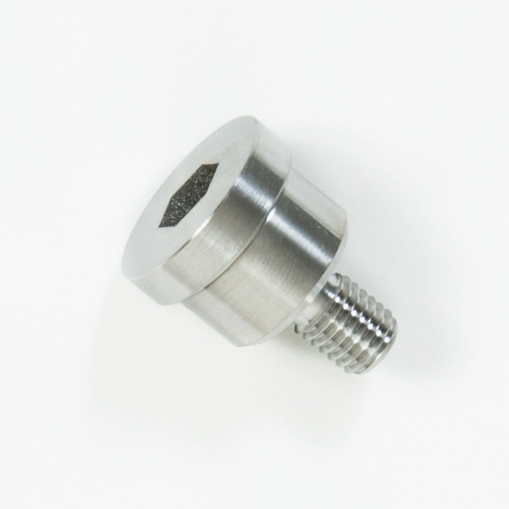A detailed image of a stainless steel retainer on a white background, highlighting their metallic surfaces and shapes.