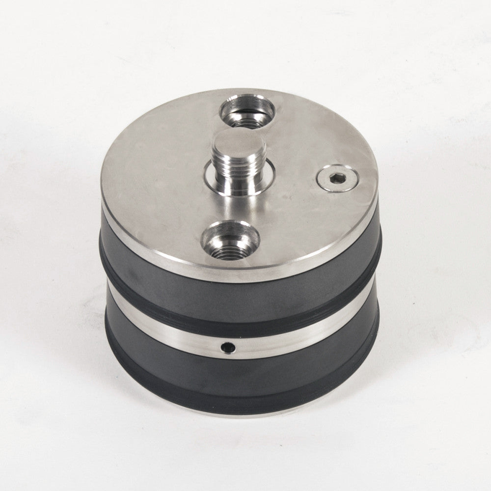 A sleek black and silver metal cylinder with two circular holes, designed for functional use.