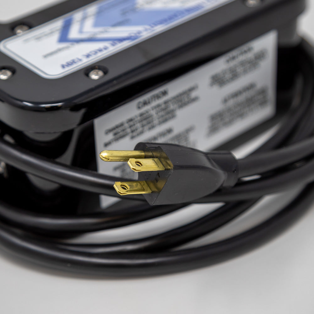 A power supply unit with a cord connected, ready for use in powering electronic devices.