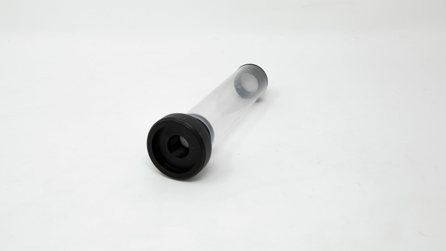 A clear plastic tube with black plastic end caps, positioned against a clean white background, emphasizing its simple design.