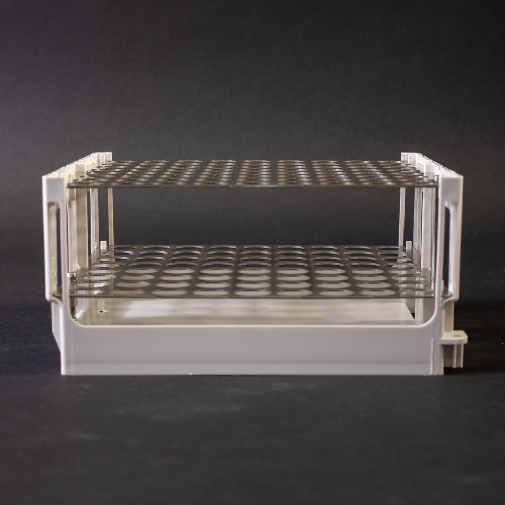 A plastic and metal rack featuring multiple holes designed for securely holding glass vials.