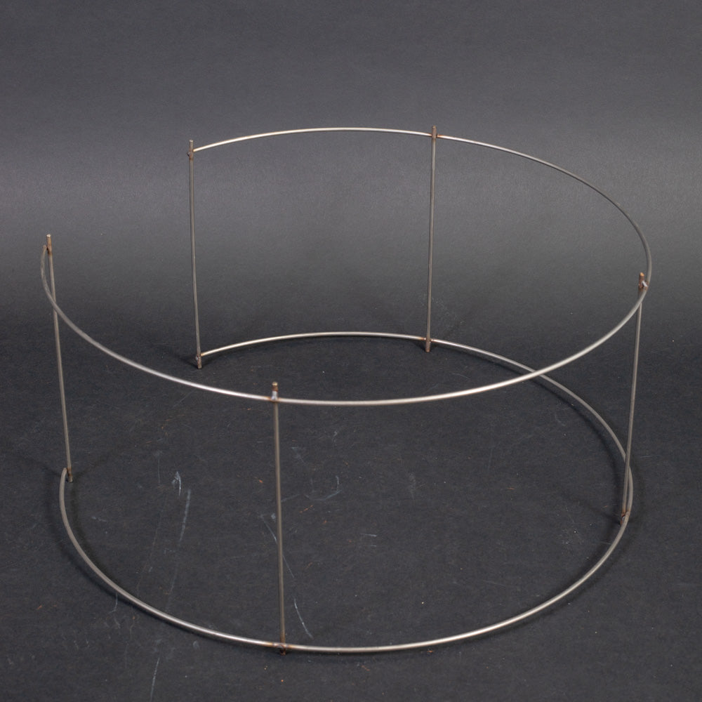 A circular metallic ring arranged uniformly around its perimeter.
