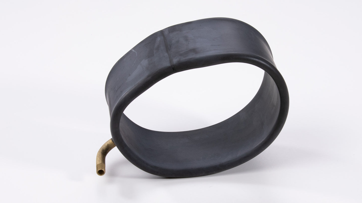 An inflatable black rubber seal featuring a gold-plated brass fitting, showcasing a sleek and durable design for various applications.