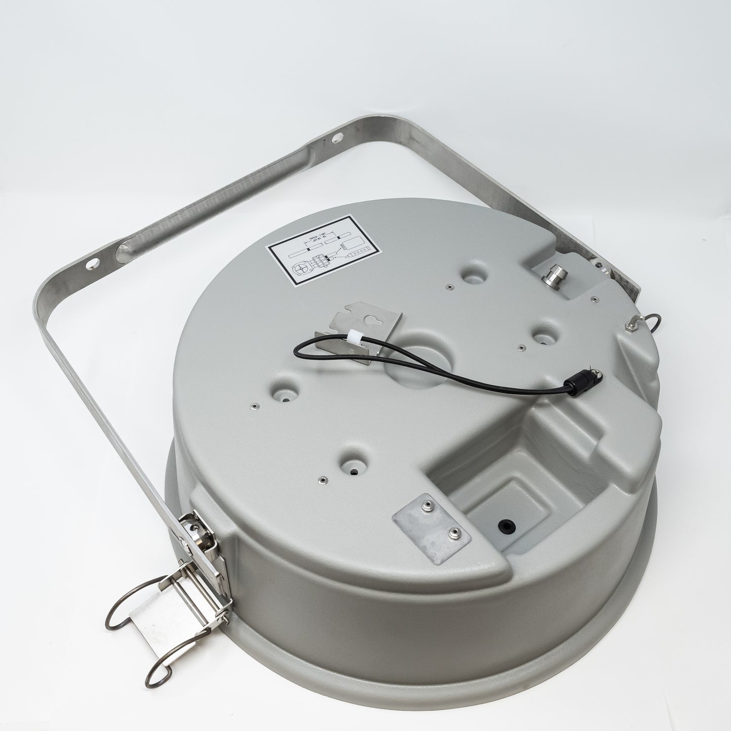 A circular grey plastic cover with a robust steel handle, designed to showcase the rugged design.