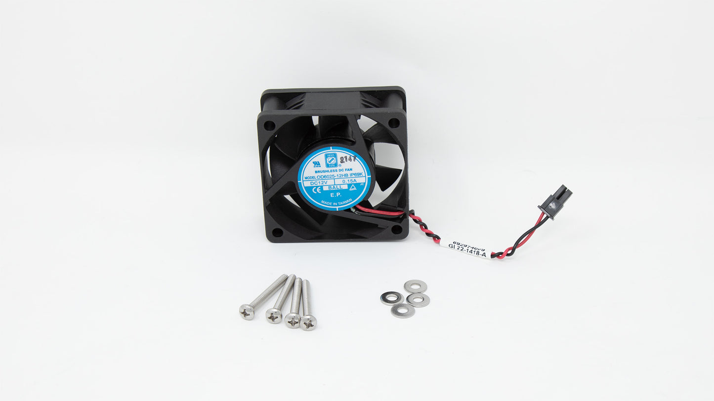 A small fan and screws arranged on a surface, showcasing essential components for assembly and maintenance.