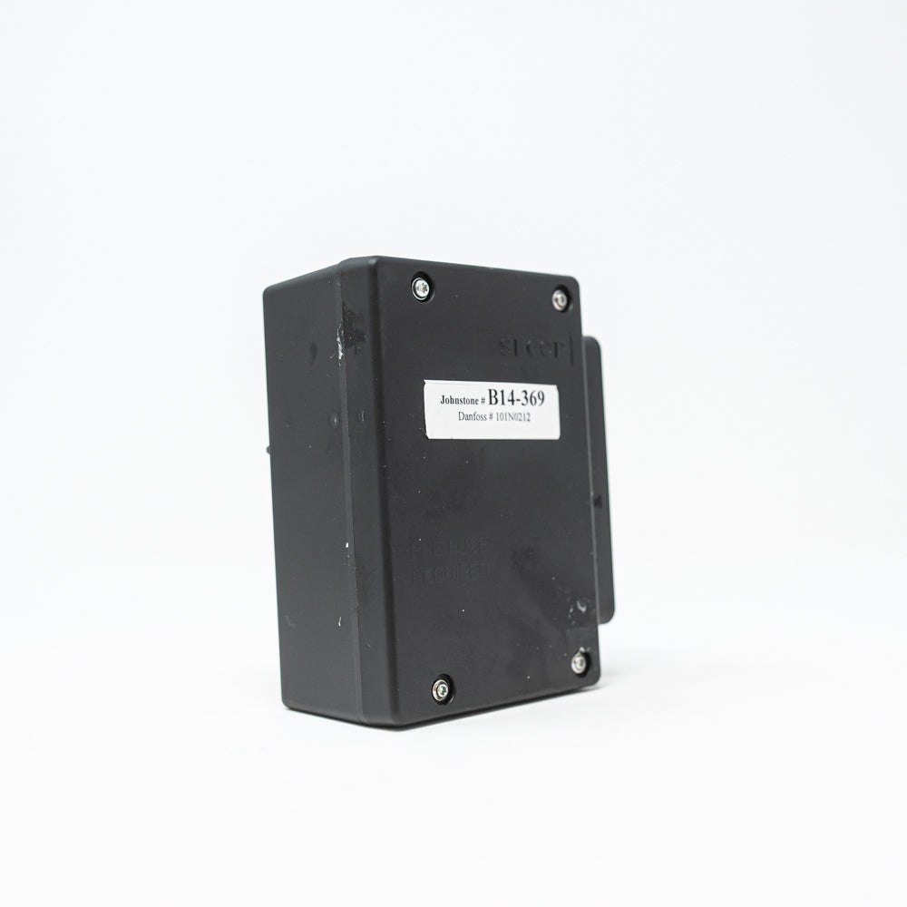 A small electronic unit, capturing the essence of its intricate design and mechanical elements.