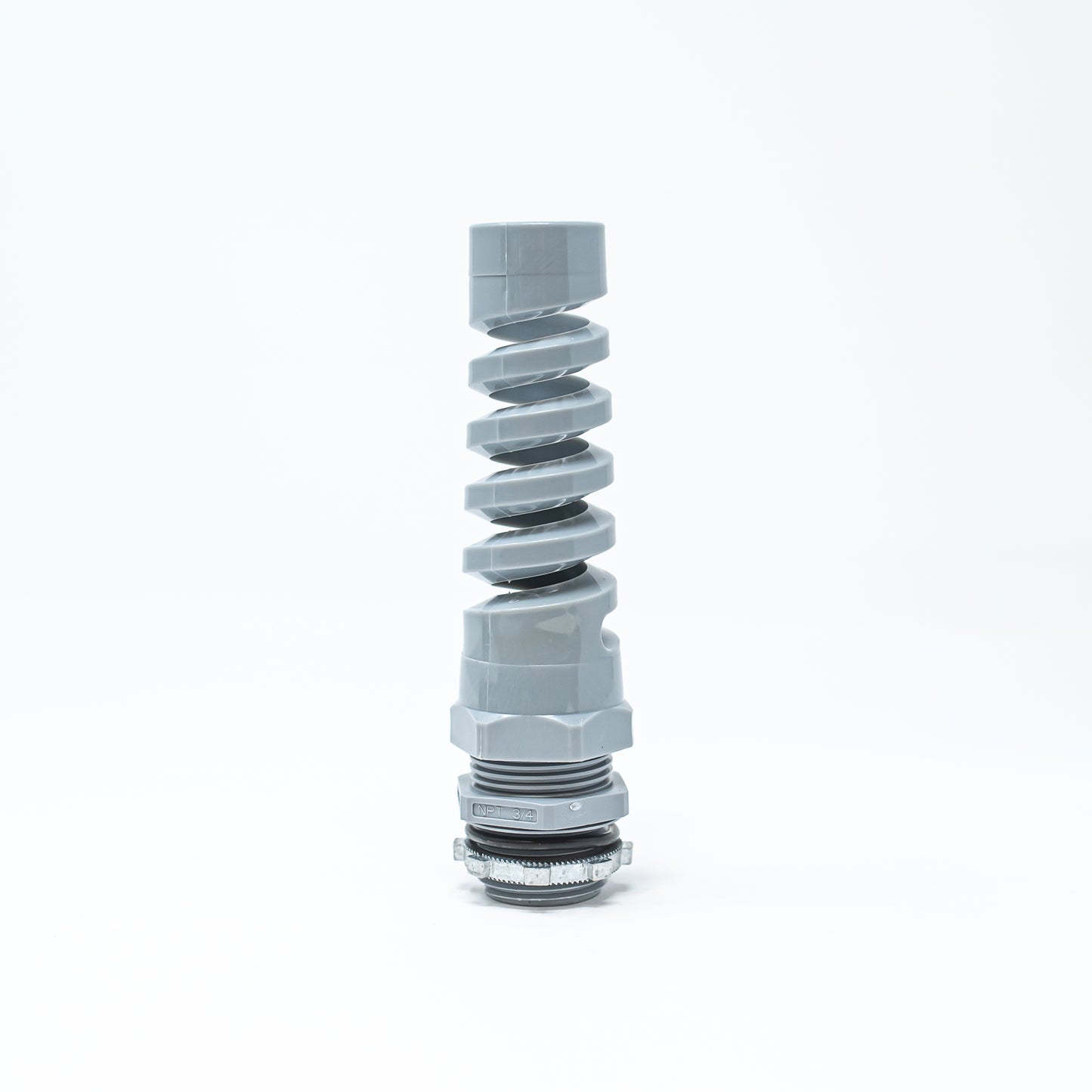 A grey plastic fitting positioned against a clean white background, showcasing its smooth surface and cylindrical shape.