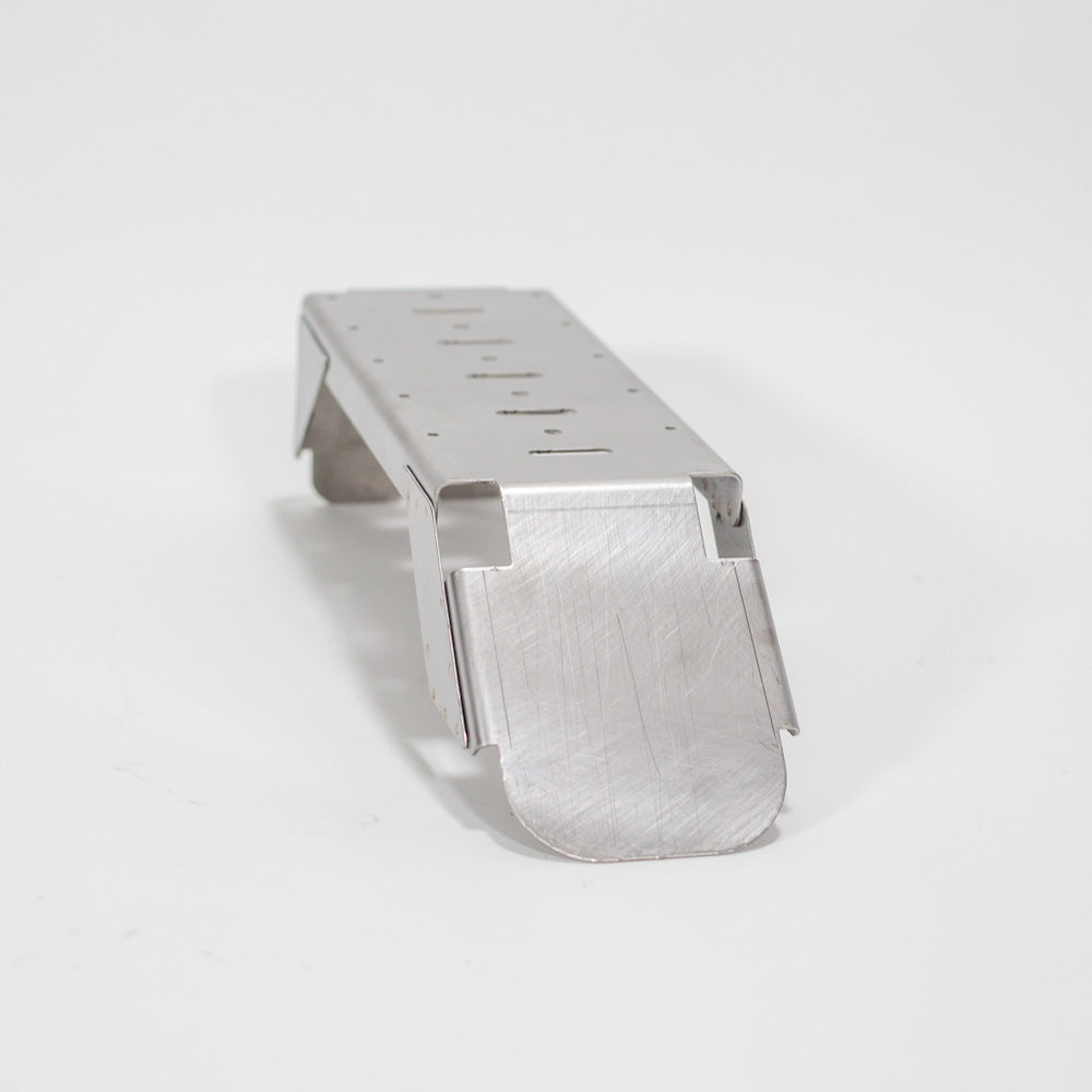 A metallic object displayed on a white background, emphasizing its polished finish and functional design.