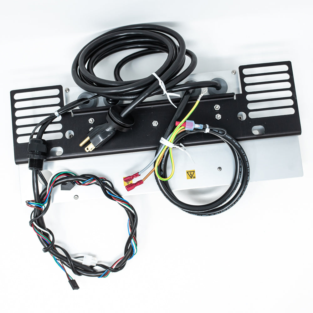 A black metal plate featuring wires and a power cord, showcasing a compact and functional design for electrical applications.