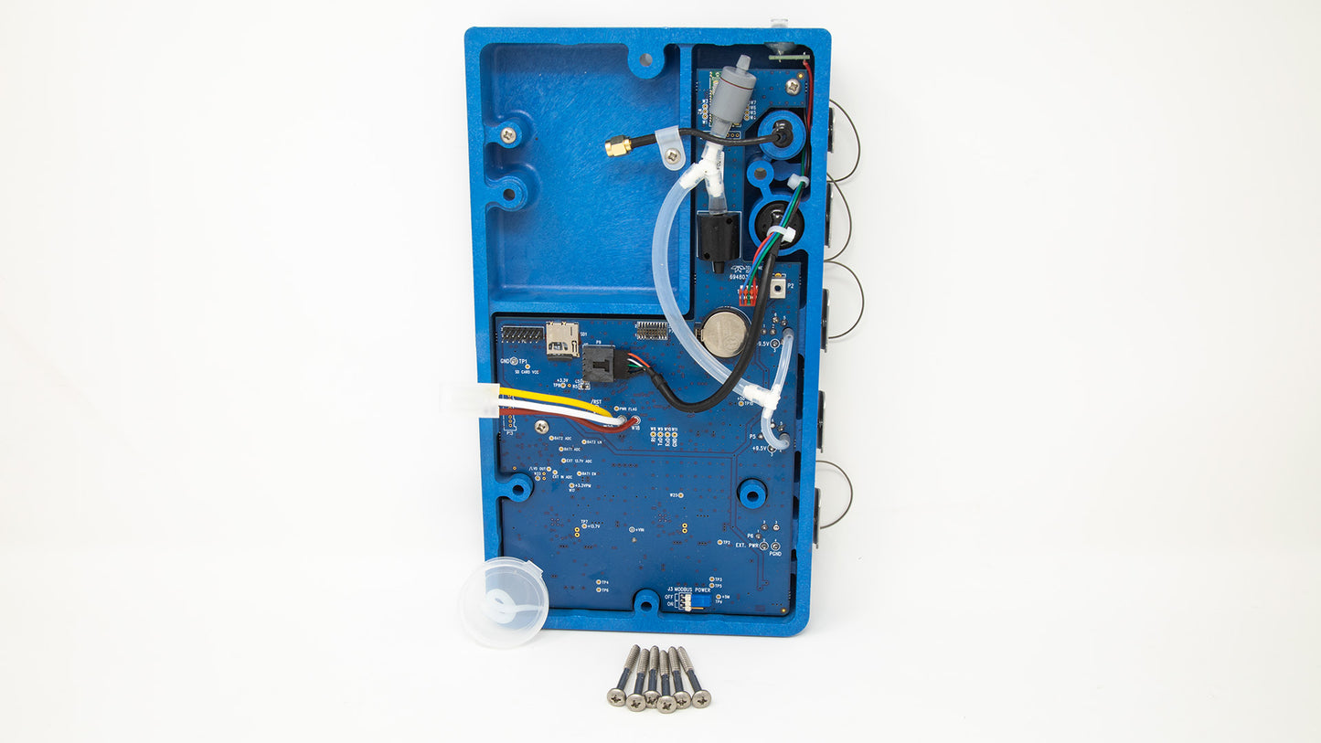 A blue electronic device with exposed screws and wires, highlighting its technical features and construction.
