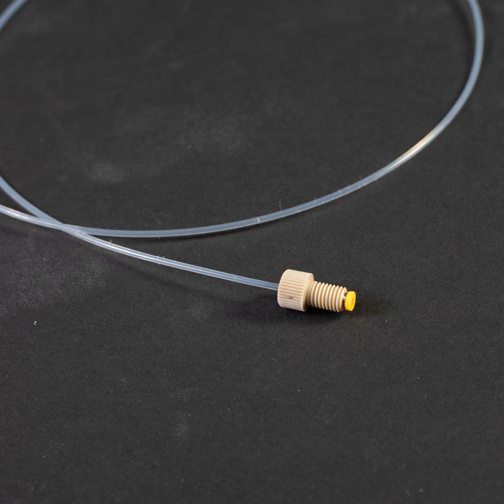 A small length of clear plastic tubing connected to a connector, illustrating a simple design.