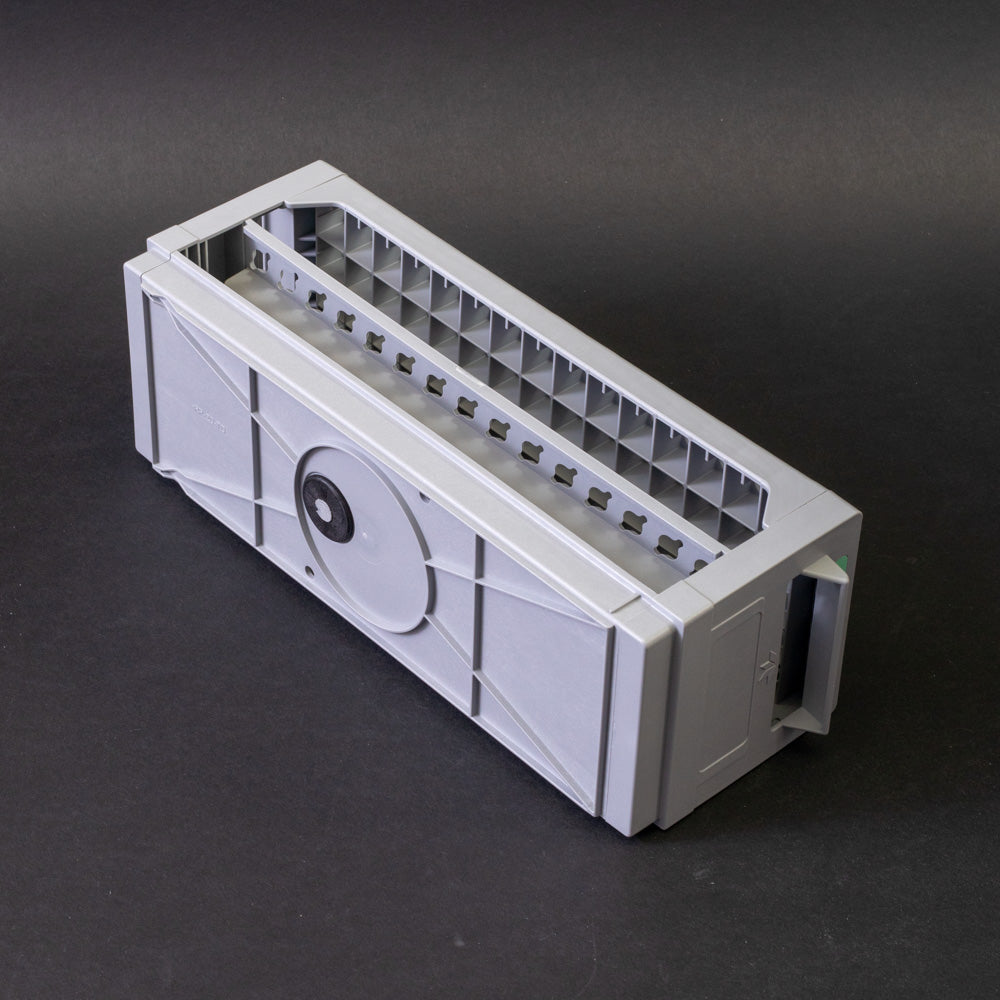 Gray plastic shelf with perforated design, allowing for location and storage of vials.