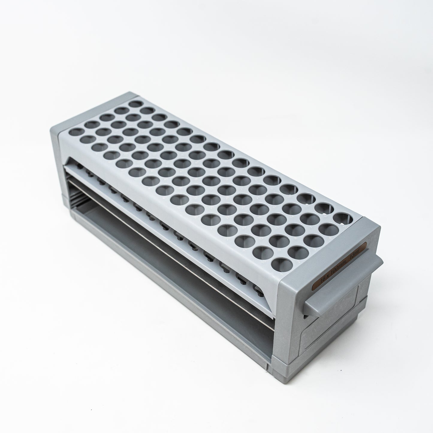 A rectangular shaped gray plastic box featuring multiple holes on its top, designed for test tube location and storage purposes.