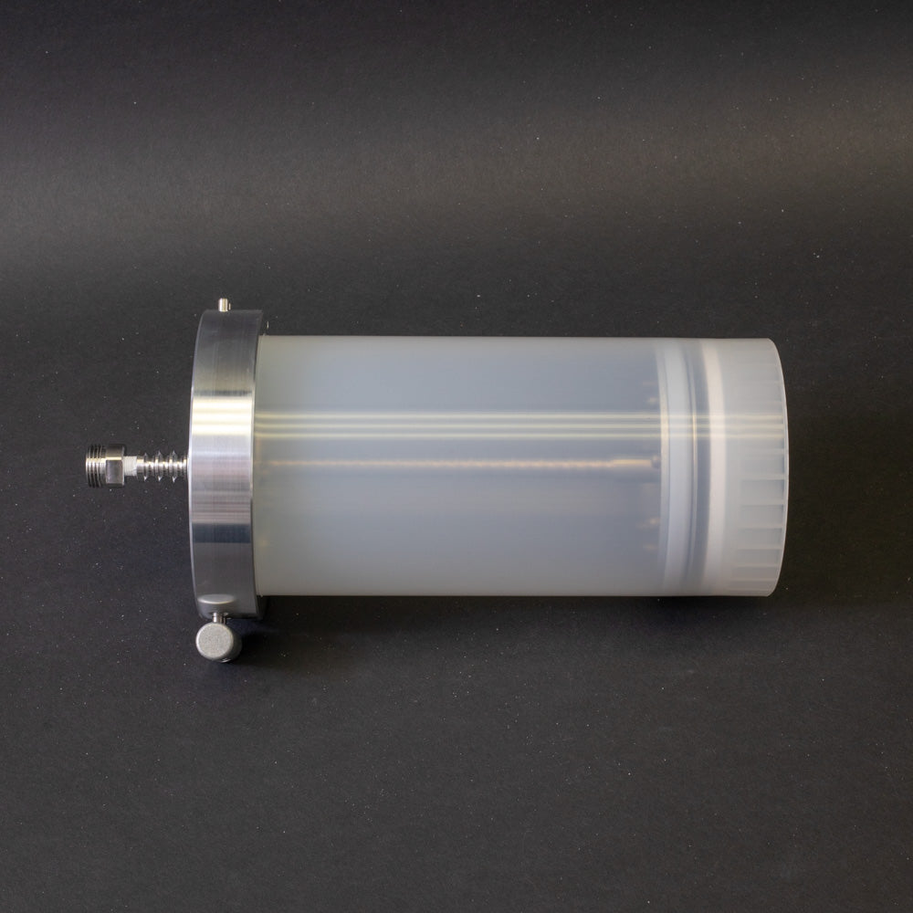 A plain white cylinder featuring a white plastic cover, emphasizing simplicity and uniformity in design.