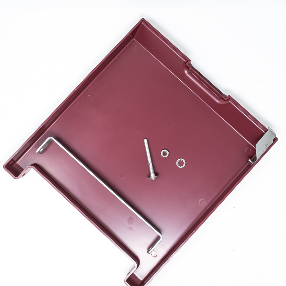 A red plastic cover featuring a screw alongside a rivet, showcasing tools for assembly or repair tasks.