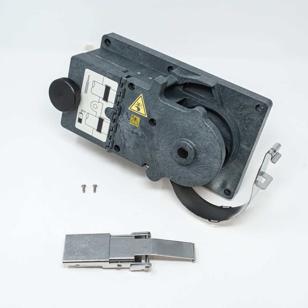 A black and gray pump next to screws and a latch, illustrating components for technical assembly or repair.