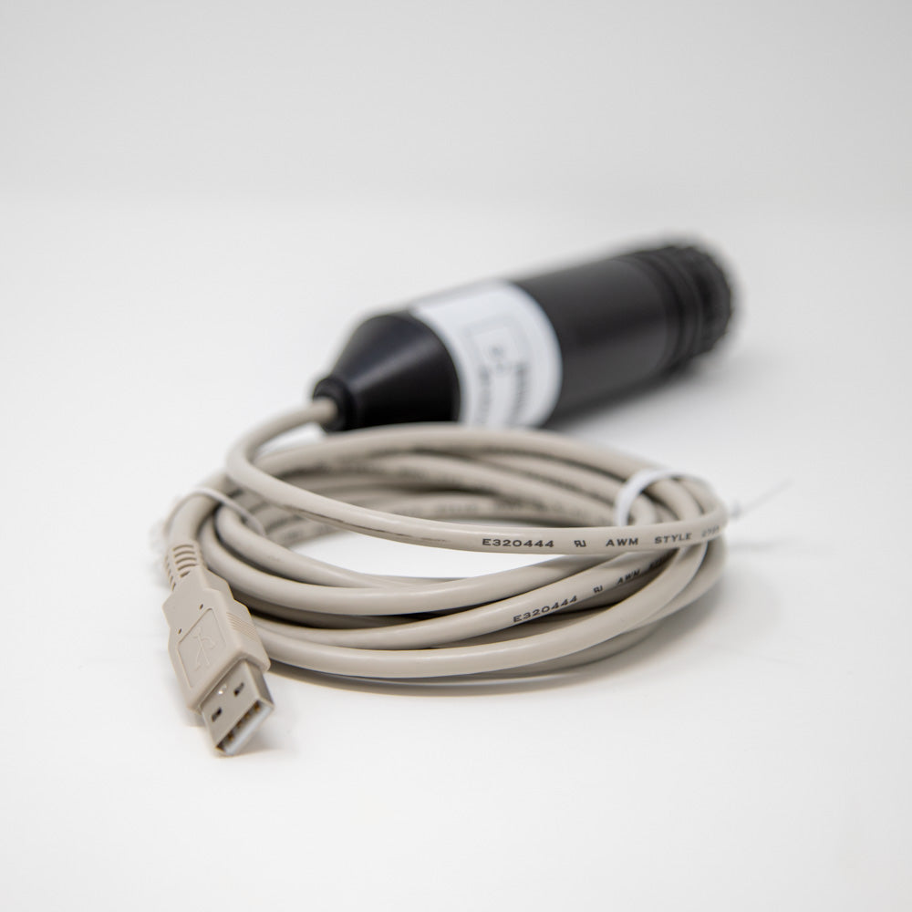 A grey USB cable linked to a black connector, showcasing the connection for power or data transfer.