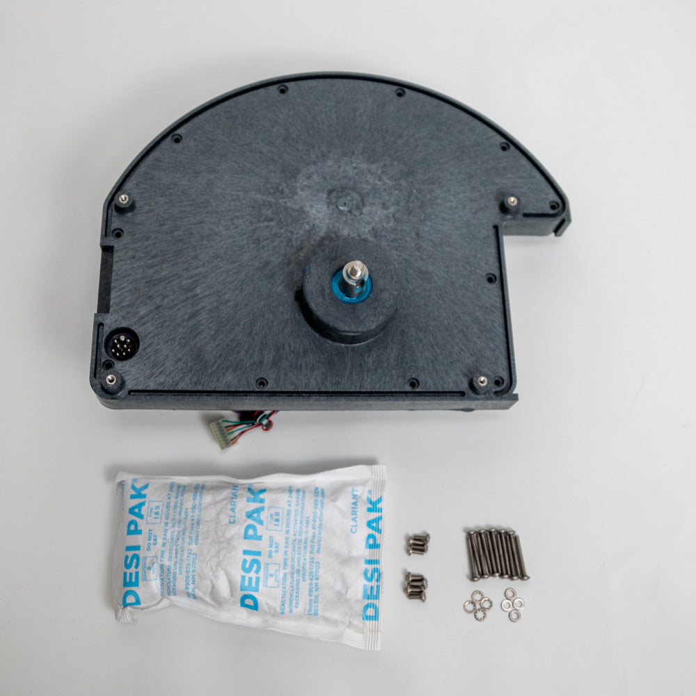 A black plastic case bottom featuring screws and a wire, showcasing its compact design and essential components.