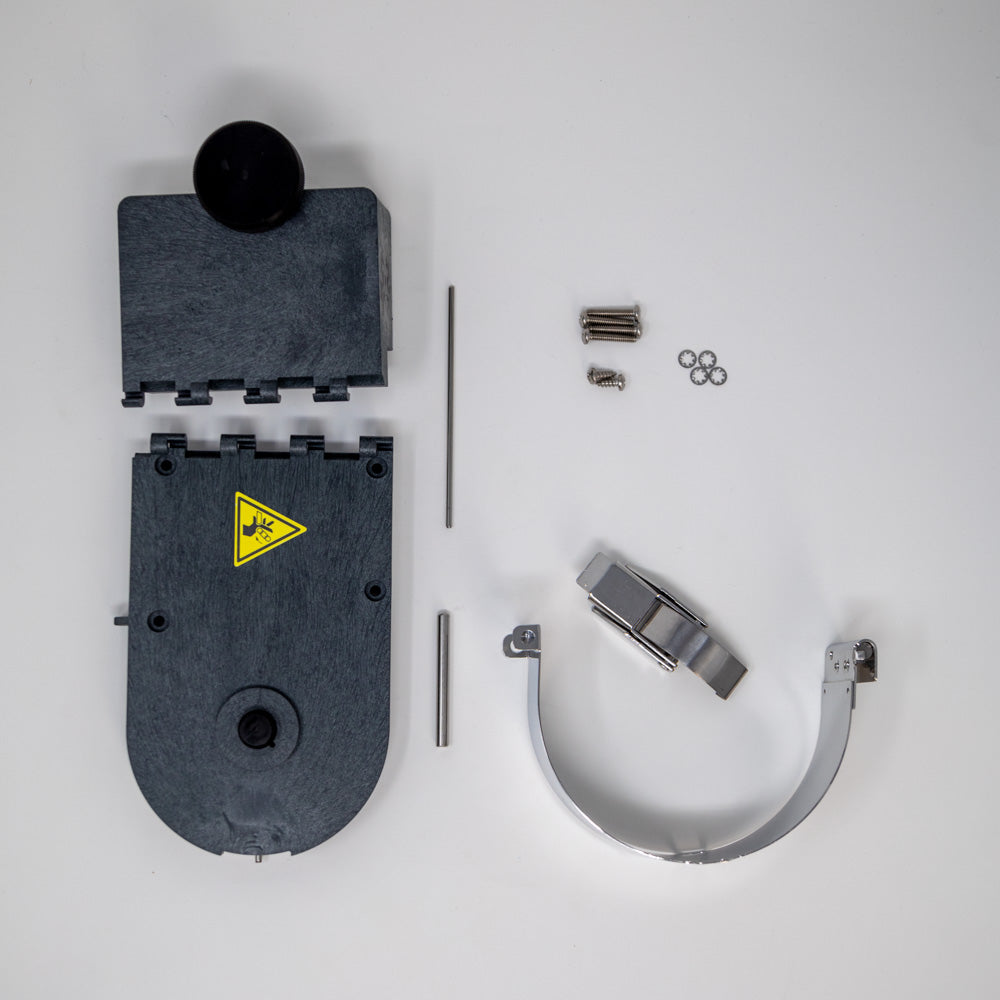 A plastic cover featuring a prominent yellow warning label indicating potential hazards or caution.